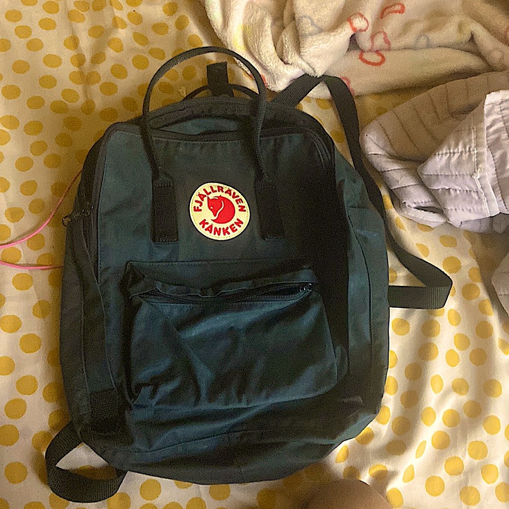 Fjall raven black school backpack.